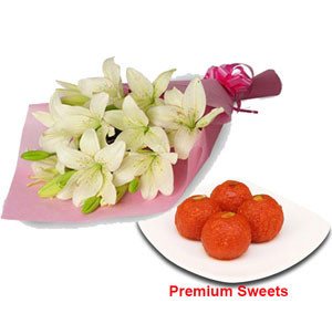 International Elegance: Sweets and Imported Flowers in a Bouquet Presentation